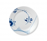 Blue Mega Salad/Dessert Plate #2 Microwave and Dishwasher Safe.

Royal Copenhagen\'s newest design is Blue Fluted Mega, which comes with an intriguing story.  In 2000, a young design student, Karen Kjaeldgaard Larsen contacted the manufactory for a new version of Blue Fluted.  The pattern was much larger and was repeated in fragments.  This design, based on genuine affection for the traditional Blue Fluted pattern, brought the design completely up to date.  It was immediately embraced by Royal Copenhagen, and the result is Blue Fluted Mega.  