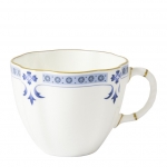 Grenville Tea Cup A round, traditionally shaped fine bone china tea cup perfectly sized for a morning cup of tea or afternoon drink. Recognized as a traditional pattern but suited to the more contemporary style, the Grenville design allows you to appreciate the translucency and delicacy of the fine bone china. The pattern features a gently fluted body creating an impression of timeless English elegance with the color being traditional mazarine blue giving a soft and restrained feel following a firing deep into the glaze. 