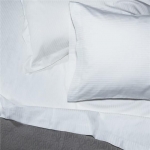Bordeaux White Stripe Queen Sheet Set As part of Garnier-Thiebaut\'s Hotel Collection, this design can be found in some of the 4 and 5 star hotels and restaurants around the world. Made especially for the hospitality industry, these linens are made with high quality cotton for softness and durability.