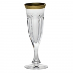 Lady Hamilton Gilded Band Champagne Flute The Lady Hamilton pattern is an example of the \papal\ cut so called because it is a derivative of the Pope pattern and its defining panel cuts. The Pope pattern was commissioned by Pope Pius XI in 1923 while its offspring Lady Hamilton was first produced in 1934. Lady Hamilton has become one of Moser\'s superlative patterns and continues to be very popular to this day.

Each stem is finished with a 24 karat gold band.

Please call store for delivery timing.