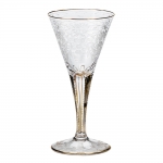 Maharani White Wine Glass First produced in 1897 and later commissioned by the Maharaja of Navancore for his wife, the Maharani. Produced in its original version, Maharani is copper-wheel engraved, gilded and burnished by hand in 24-karat gold.