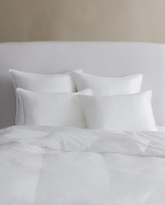 Arcadia Medium Fill Queen Pillow The right pillow is vital to a good night\'s sleep. Arcadia Down-Alternative pillows have a loft that is just right - not too full, not too flat - for supremely cushy and cozy slumber.

Fill:
Pluma-fil Down-Alternative

Ticking:
330TC 100% Cotton Sateen

Construction:
15\ Baffle Box
Piped Edging
Corner Loops

Country of Origin:
Made in USA of imported materials

Care:
Machine wash cold water on gentle cycle. Do not use bleach (bleaching may weaken fabric & cause yellowing). Do not use fabric softener. Tumble dry on low heat.

