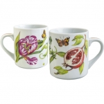 Summerlea Mug Julie Wear gathers ordinary fruits and vegetables from the garden and combines them together in unexpected ways to create a pattern of delightful color and movement. 