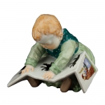 Child Sitting with Book Hand painted in Meissen, Germany