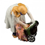 Girl with Doll\'s Pram 5.25\ Height

Kind mit Puppenwagen
Designed by Julius Konrad Hentschel, 1905

Hand painted in Meissen, Germany
