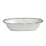 Carlton Gold Open Vegetable Bowl Serve up your vegetables or potatoes in this open vegetable dish, shaped with fanned out rims, to truly impress your dinner guests. A simple but stylish gold pattern of tiny diamonds set in a finely drawn border gives an elegant appearance. The versatile pattern combines with other patterns to create a personalized style or theme. 