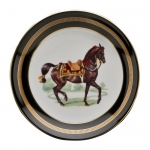 Imperial Horse Bread and Butter Plate Inspired by 18th century Continental paintings depicting the Noble Horse of Royalty, Julie Wear presents high spirited horses caparisoned in regal trappings, with ornamental saddles and bridles and adorned with tassels; she translates them into a highly sophisticated design that makes a bold statement on any table. Dramatic black ground accented with gold, including hand painted burnished gold cup handles enhances the splendor of the magnificent Imperial Horse.

Please call store for delivery timing.