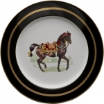 Imperial Horse Buffet Plate Inspired by 18th century Continental paintings depicting the Noble Horse of Royalty, Julie Wear presents high spirited horses caparisoned in regal trappings, with ornamental saddles and bridles and adorned with tassels; she translates them into a highly sophisticated design that makes a bold statement on any table. Dramatic black ground accented with gold, including hand painted burnished gold cup handles enhances the splendor of the magnificent Imperial Horse.

Please call store for delivery timing.
